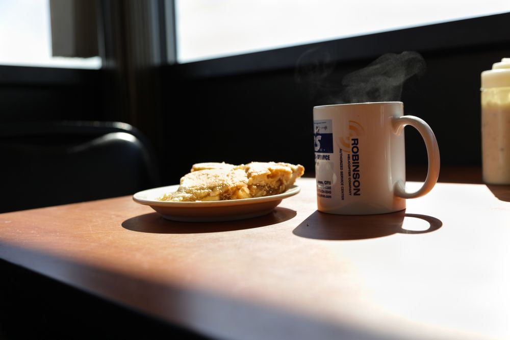 Apple pie with a hot cup of coffee